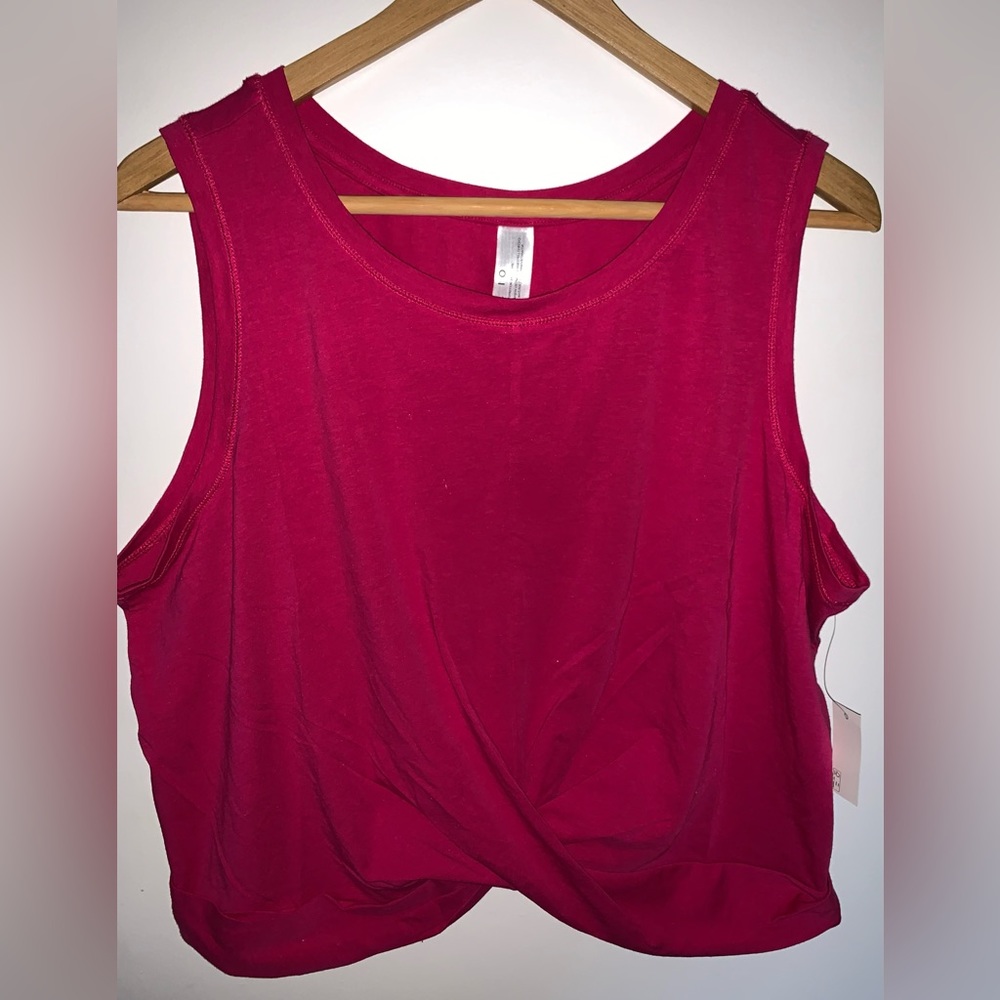 NWT pink athletic tank. Size 2x. Features a fun detail in the front